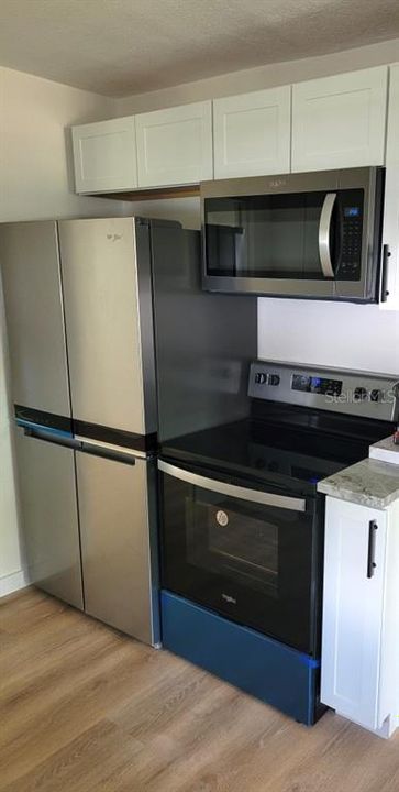Brand new kitchen, quartzite counters, all new appliances.