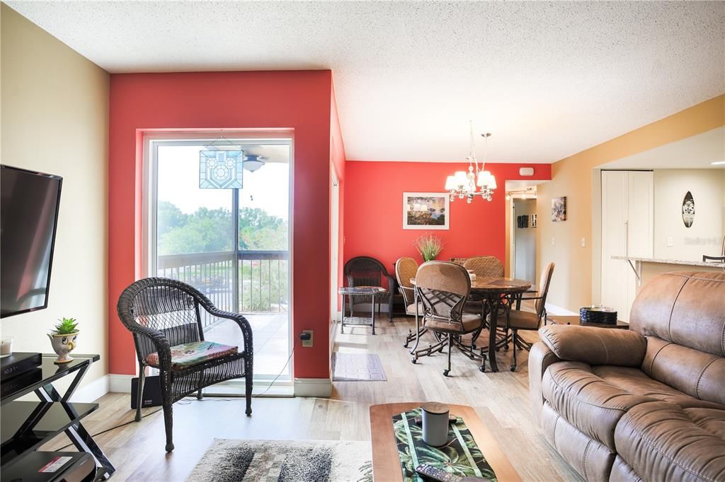 View of living area, porch and dining