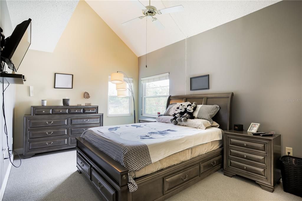 master bedroom with high ceilings