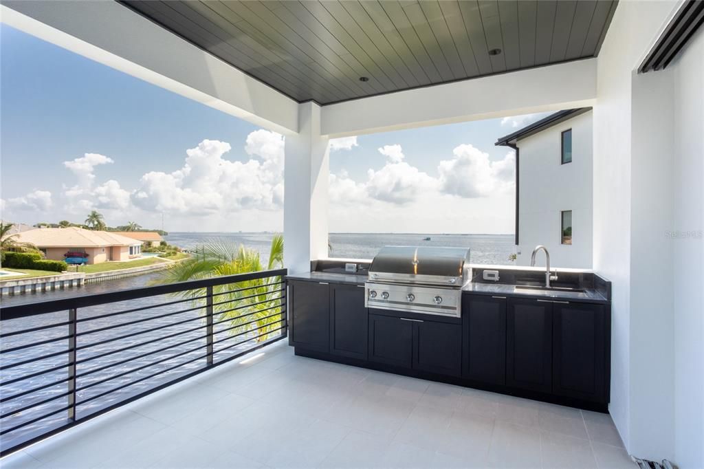 Outdoor kitchen with Natural Gas grill and views of Downtown Tampa