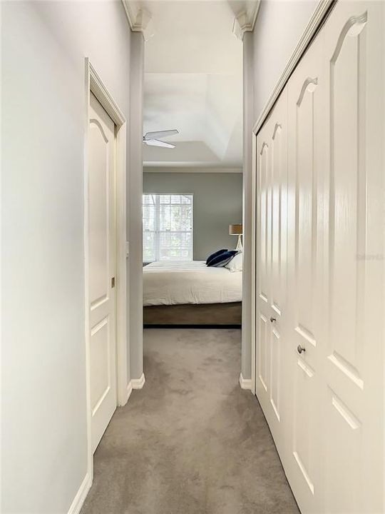 Closets on both sides between ensuite bathroom in Master
