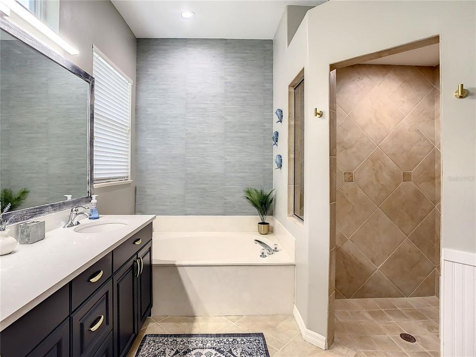 Double sinks, separate soaking tub and walk-in shower in Master bath