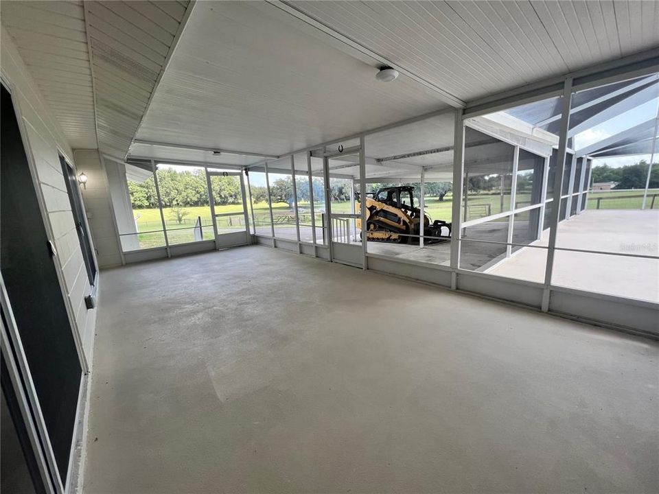 Screened Lanai leading to 4 car covered carport