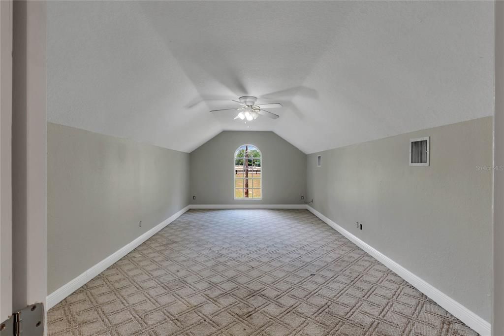 Large 300 sq. feet - Bonus room upstairs, add a closet and you'll have a 4th bedroom.