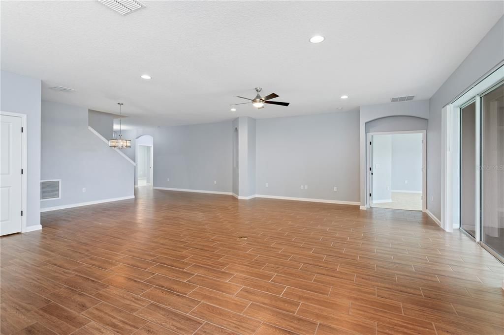GREAT ROOM OFFERS 4 ADDITIONAL RECESS LIGHTS AND A CEILING FAN.