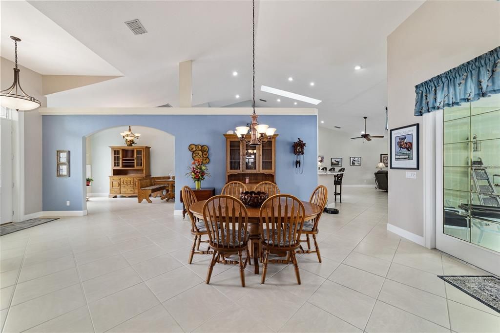 FORMAL LIVING ROOM WITH FRENCH DOORS TO THE POOL