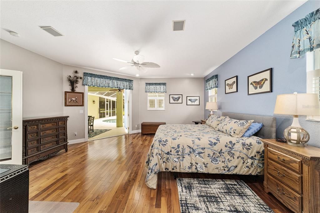 MASTER BEDROOM W/FRENCH DOORS TO THE POOL