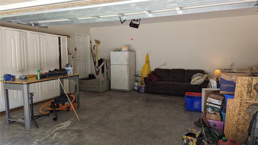 Spacious Garage w/Storage Cabinets