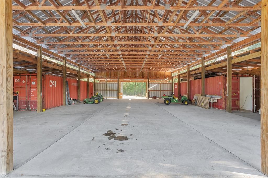 Beautiful aisle barn with TWO retro-fitted containers for self-sustainable homestead.