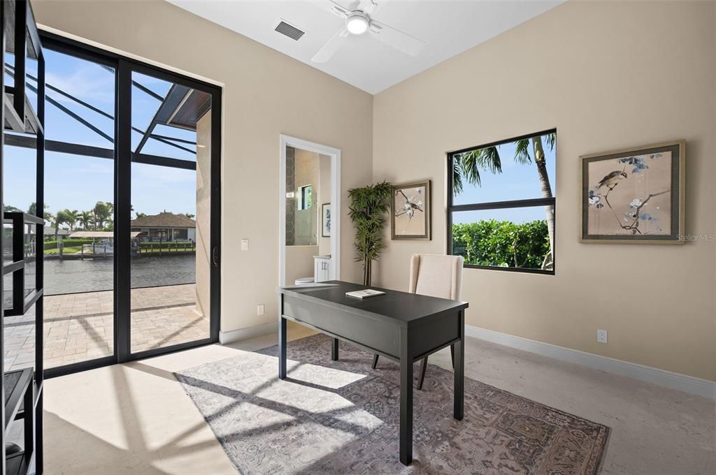 Bedroom 3 with walk-in closet. Patio door to pool area