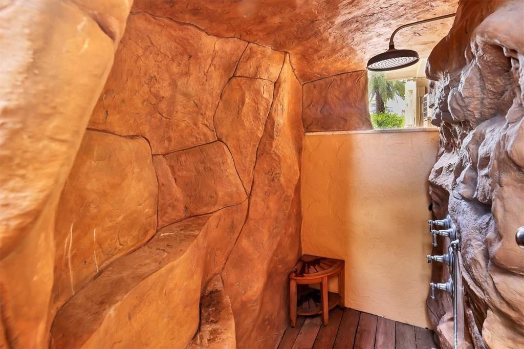 Theme park looking stone like Shower stall you'll love