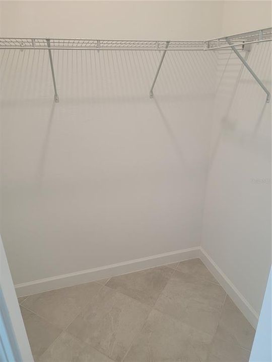 1 of 2 Master Walk-in Closets