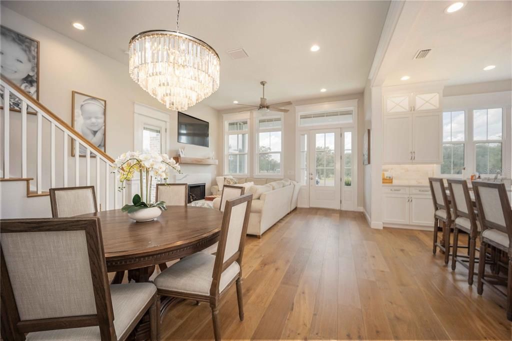 Dining area with easy access to living area, kitchen, and second floor!