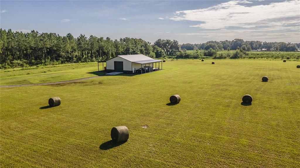 Aerial view of barn on 19.72 ACRES!