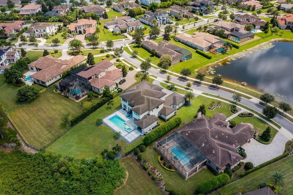 Community retention pond across the street and conservation to the rear give you peace and tranquility all around this fine estate.