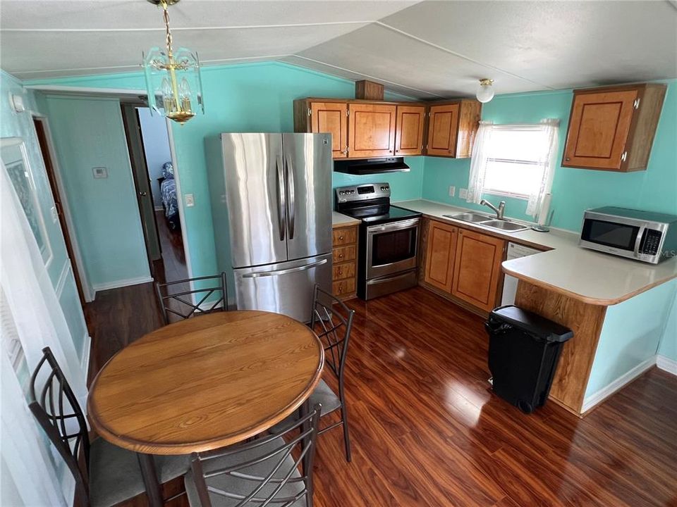 Dining room and kitchen.