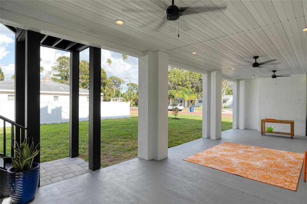 1ST FLOOR BACK PATIO WITH PASS-THROUGH WINDOWS TO GARAGE