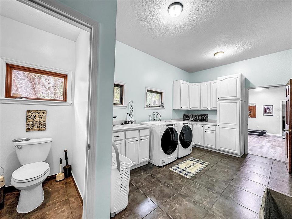 Huge Utility Room with a half bath