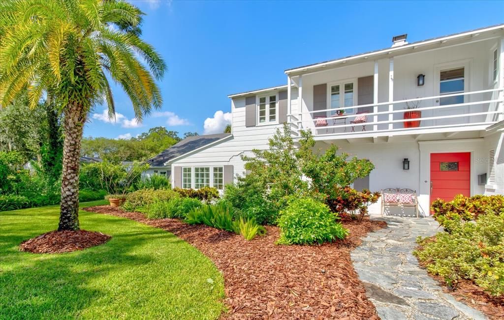 Front yard with mature landscaping.