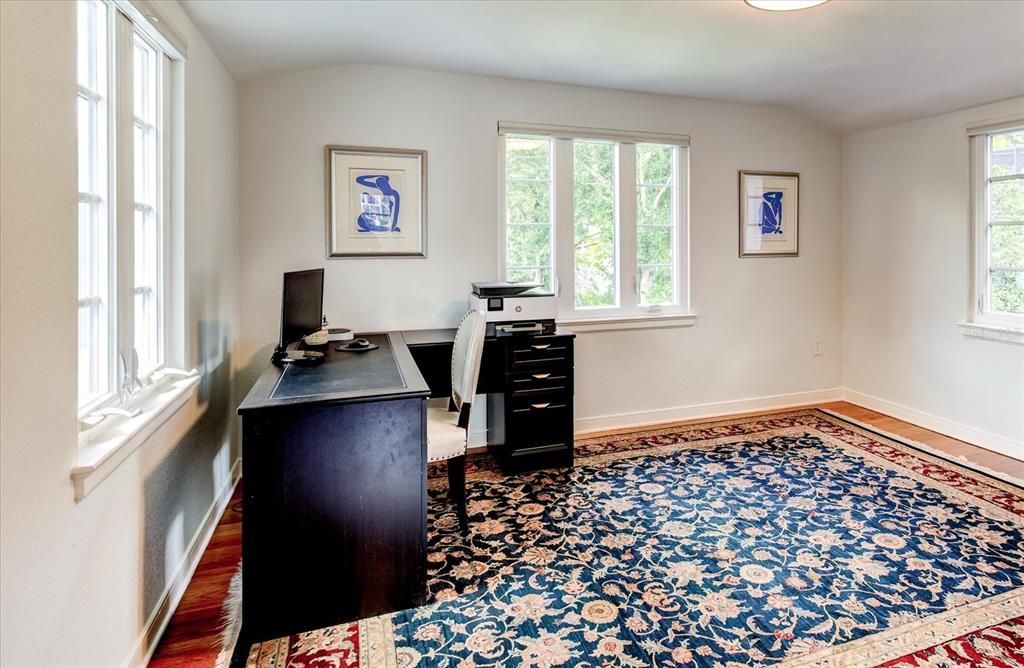 Bedroom 1 used as an office looks at at the lake.