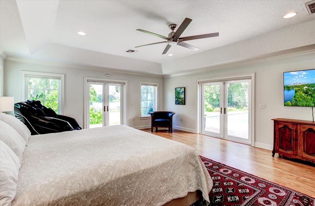 Master bedroom looking out on pool.