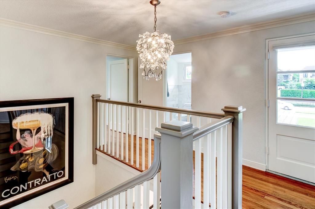 Upstairs landing with beautiful vintage chandelier.
