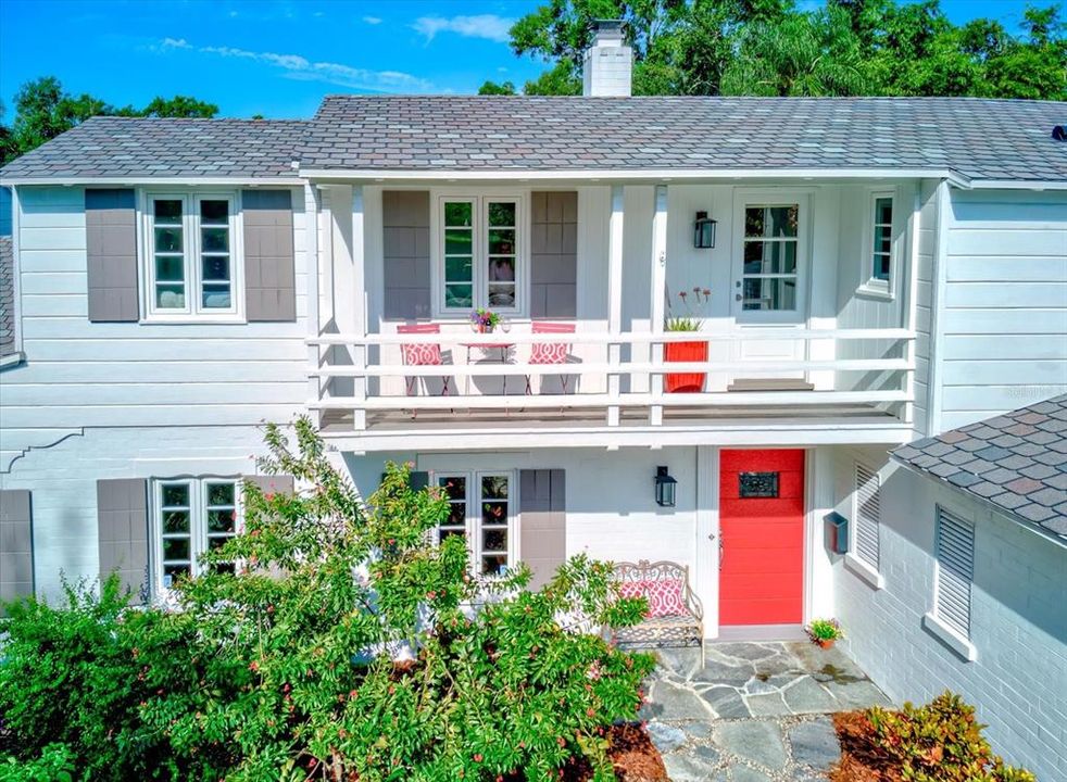 Front facade with 2nd floor balcony/porch.