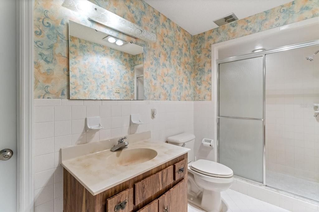 Master Bathroom...Tiled Shower w/ Sliding Shower Doors