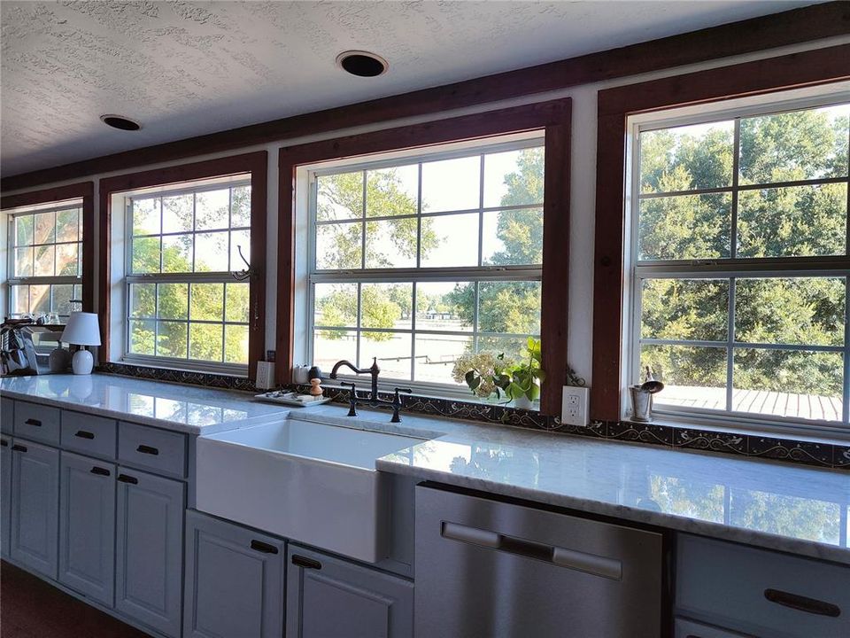 Farmhouse Kitchen Sink with views to the barns and paddocks beyond