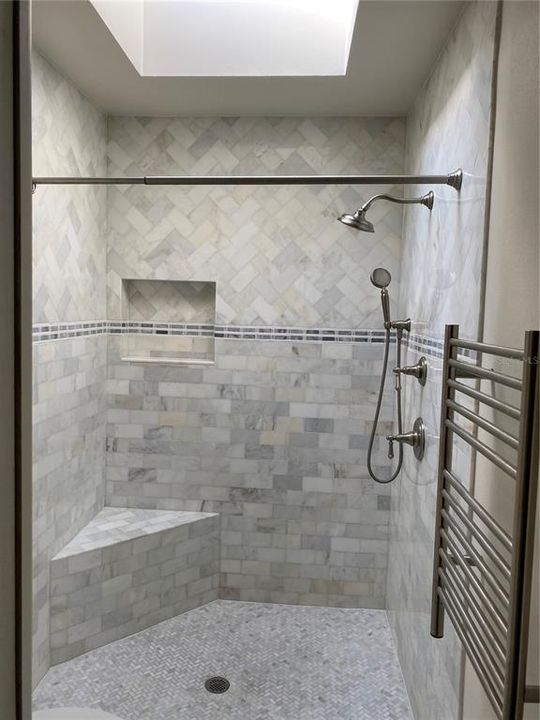 Large walk-in shower for ease of access for all, even a heated towel rack for those winter days when stepping out of the shower.