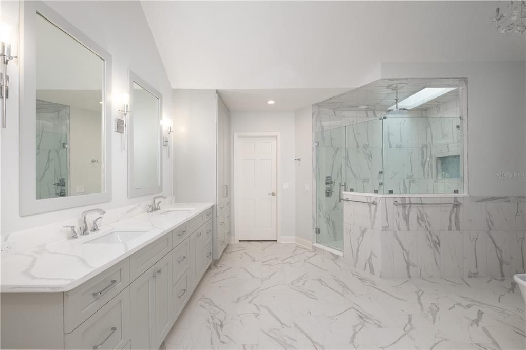 Luxurious Master Bath with Man Made Quartz Counter tops