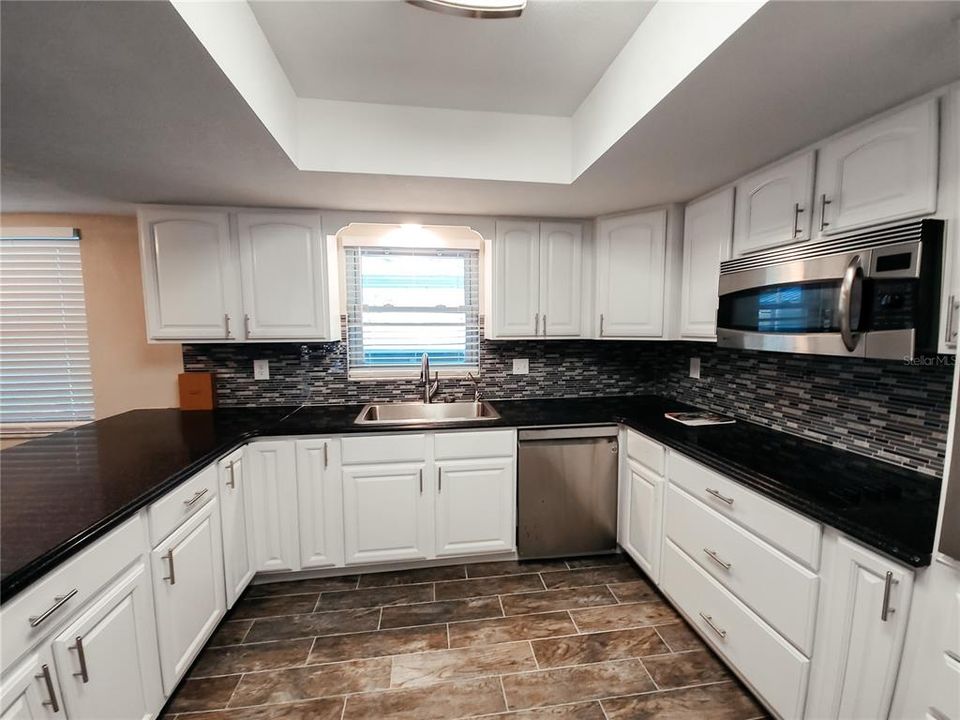 Enjoy the amble work space in this Kitchen