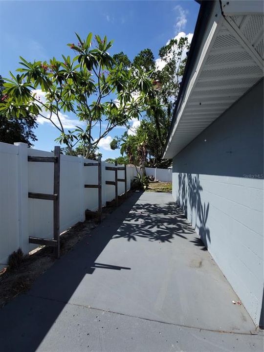 also has paved area to the left of the garage for added storage of items...