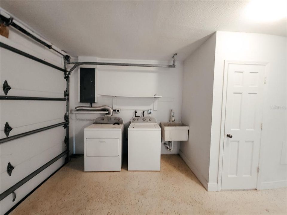 There is an attached 3 car side entry garage with laundry area and 3rd bath!