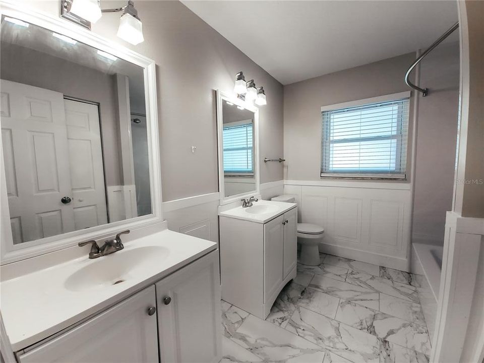 3rd Bath upstairs with dual vanities, mirrors and sinks