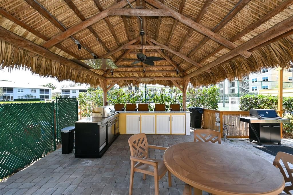 Tiki hut with grill stations