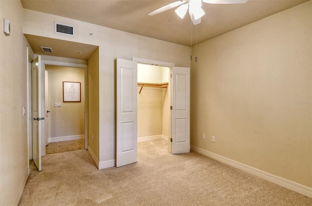 Walk-in closet in the 3rd bedroom and a pocket door connect to a 2nd bathroom