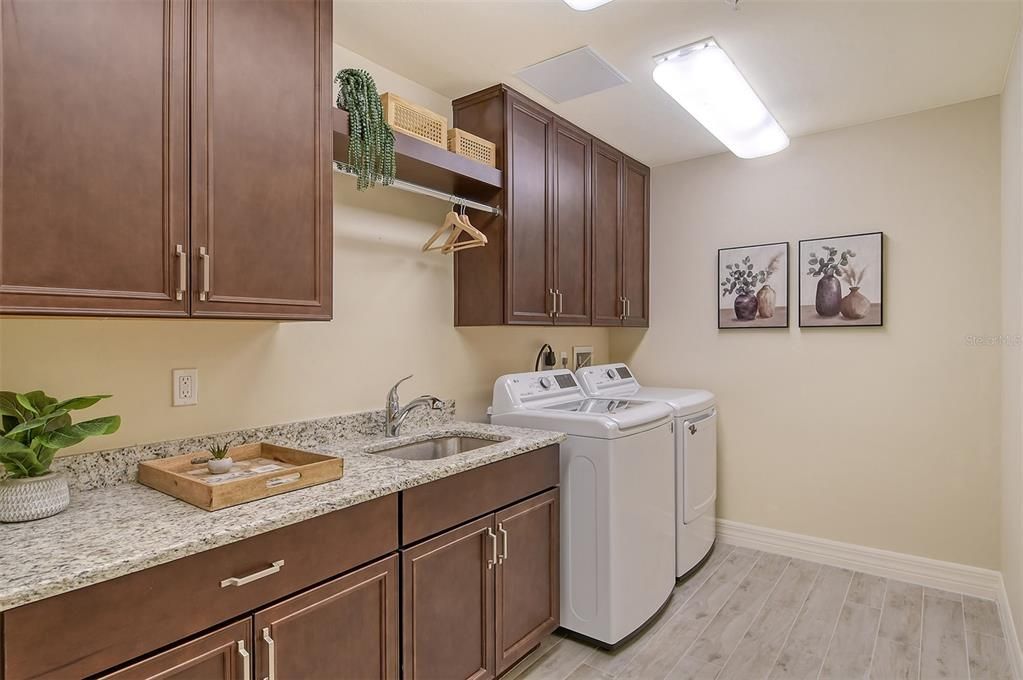 Full size laundry room in the unit