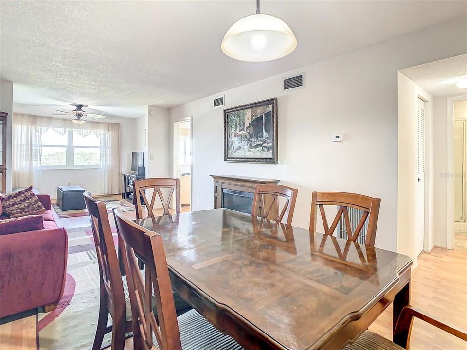 The dining room overlooks the living area.  You could configure the living space to however you would like.