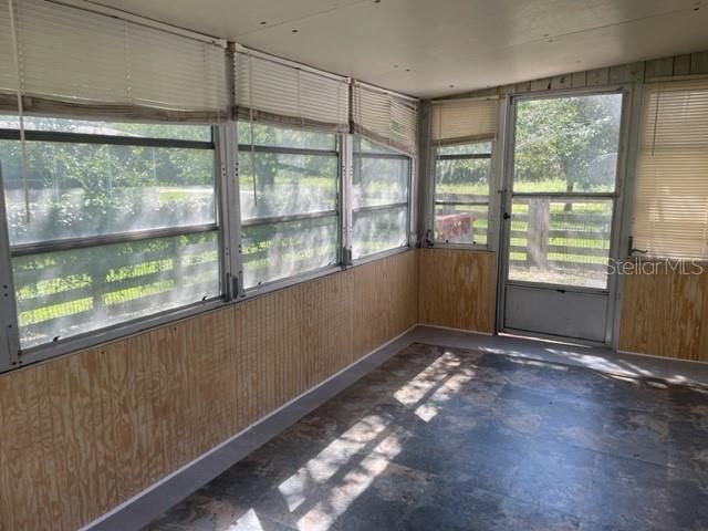 Back Screened Enclosed Porch (off the kitchen)
