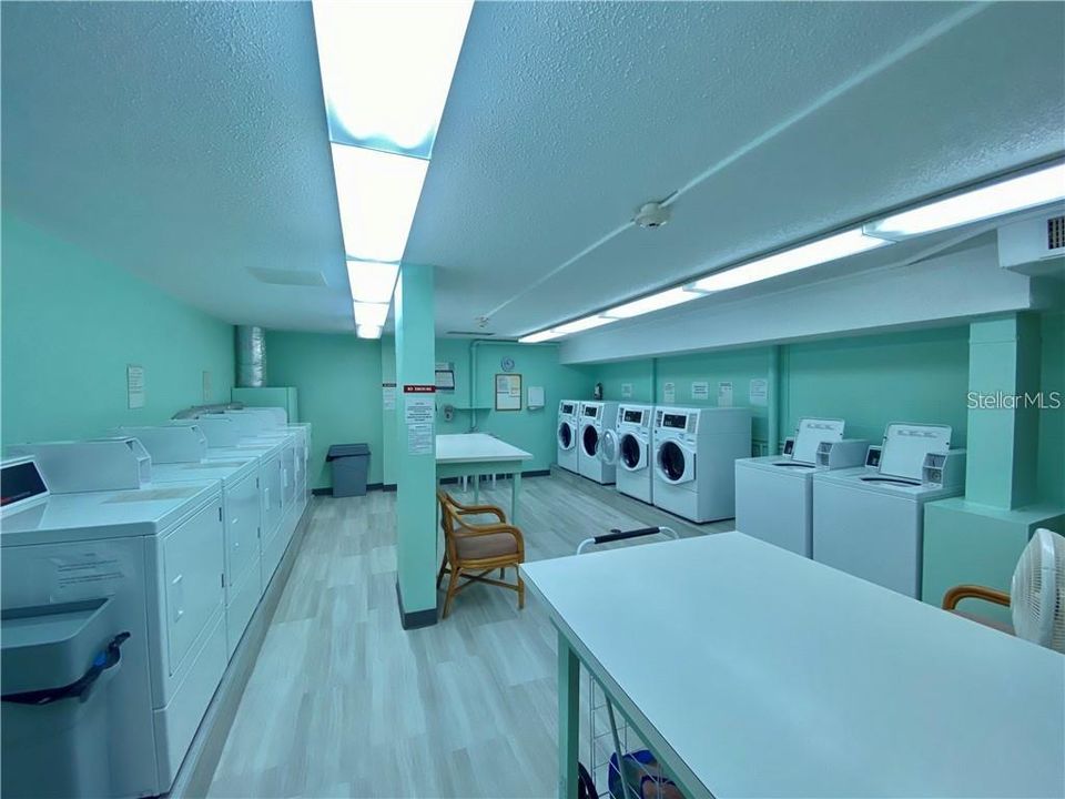 Immaculate laundry room with updated machines