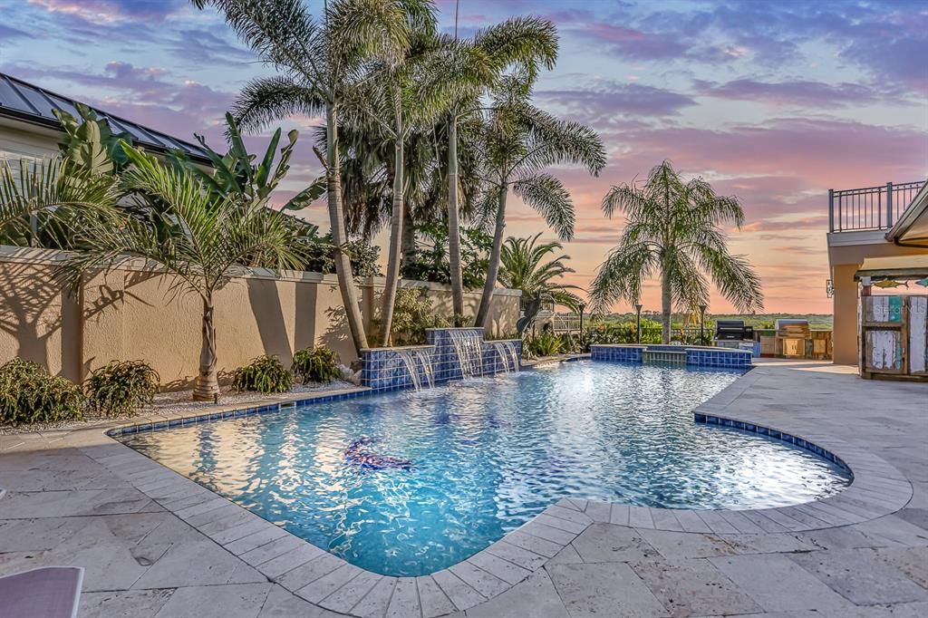 Pool with water fountain accents