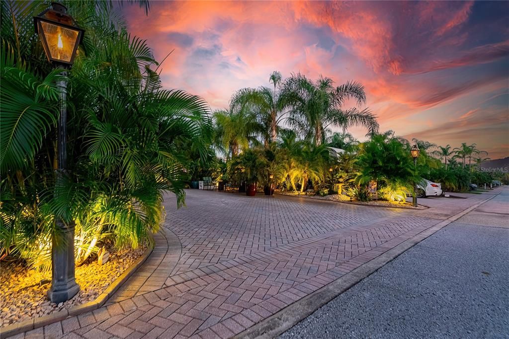 Stunning Luxury RV Coach lot with New Orleans propane light post featured at twilight hour