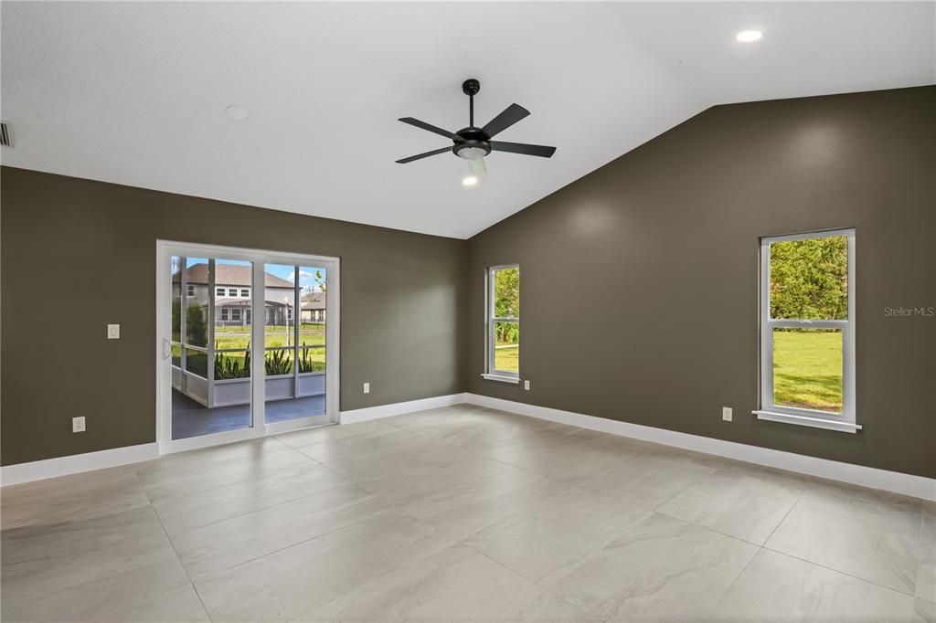 Master Bedroom with slider access to back screened in patio