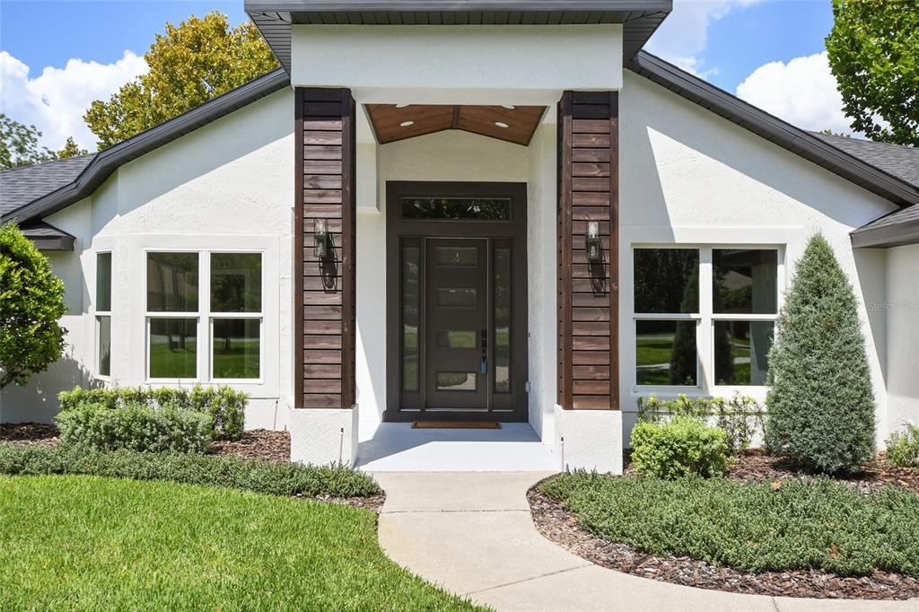 Custom made wood pillars give this home such a stunning design