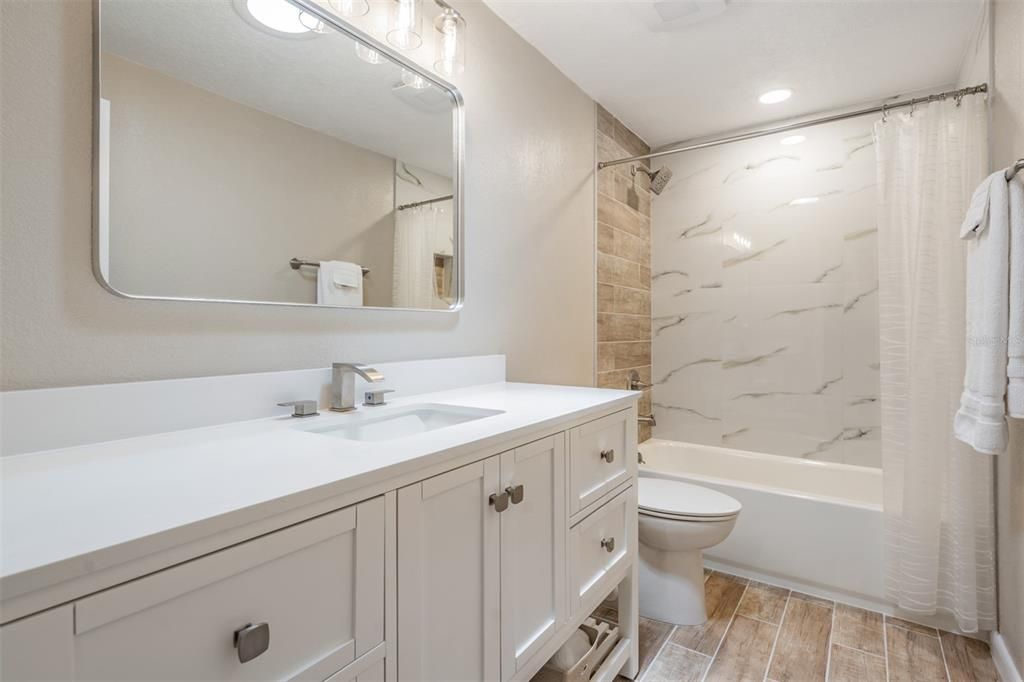 Remodeled bathroom shared between 2nd and 3rd bedrooms