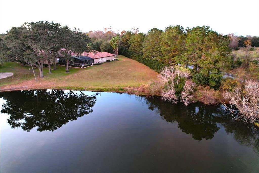 107 feet of pond frontage. Lot can accommodate a 2700 SF home!
