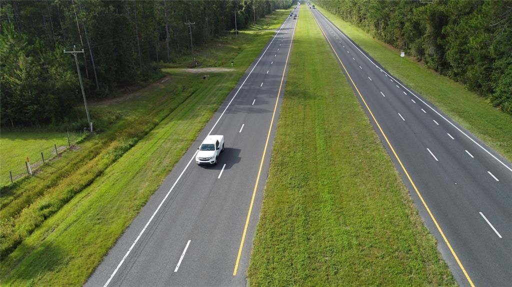 Aerial View - Over 20,000 vehicles per day travel US Hwy 301, only 12 miles from Gainesville Raceway which is home to Gator Nationals, drag racing & NHRA racing. US Hwy 301 is 1,099 miles & runs from Sarasota, FL to Delaware.