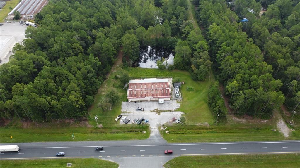 Aerial View - This iconic gem, right off 301, has witnessed decades of hard work, innovation, and craftsmanship. Now, it's ready for a new chapter in it's storied existence. - 6904 Bldg - 7.99 acres