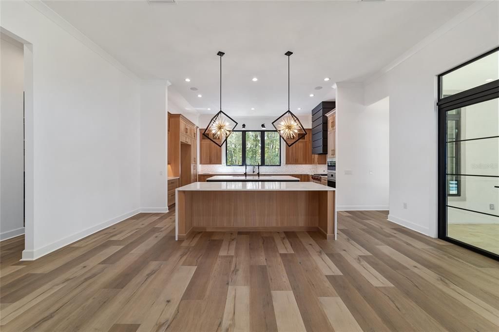 LOOKING INTO KITCHEN FROM DINING - TWO ISLANDS MAKES FOR AN AMAZING KITCHEN